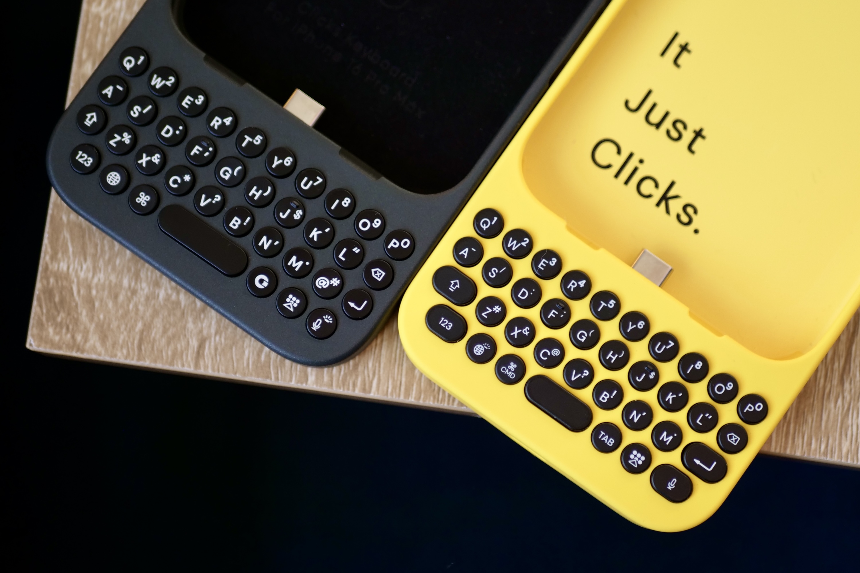 The Clicks Keyboard for iPhone 16 and the original version.